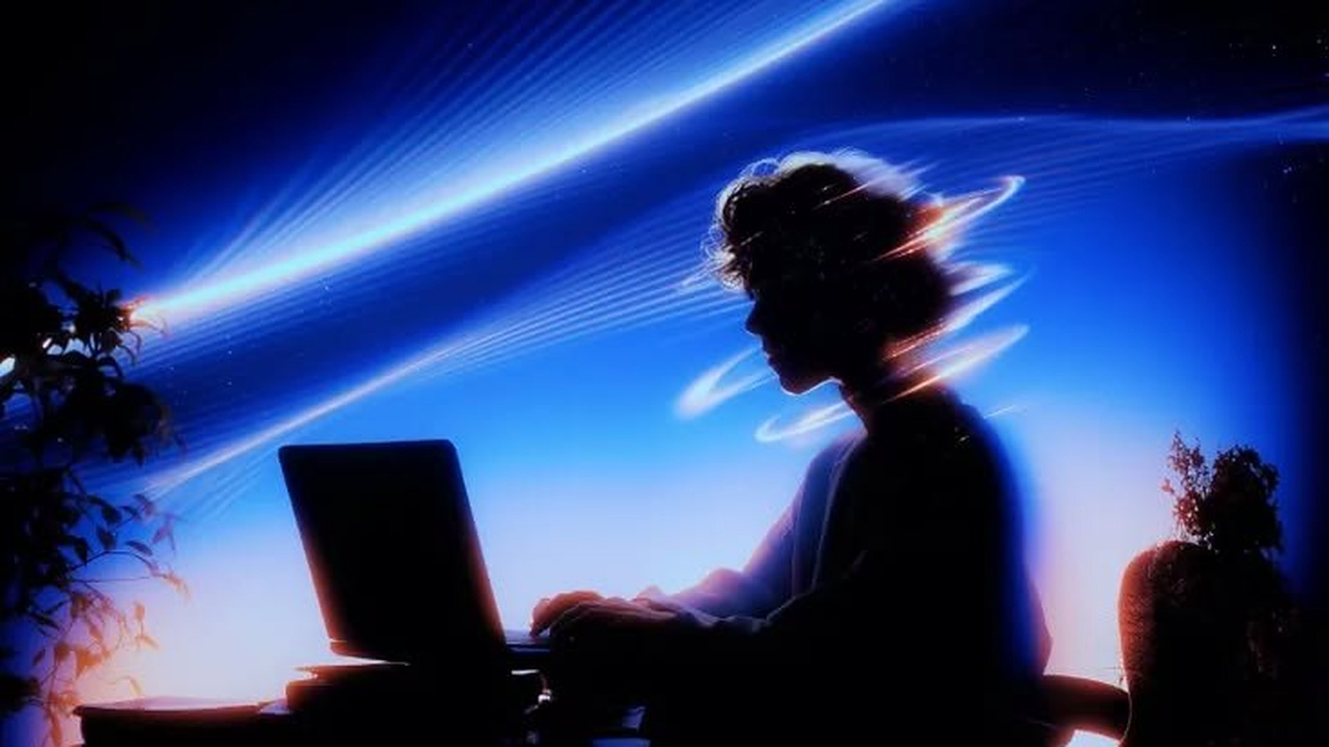 Iemand werkt 's avonds aan een laptop, met lange lichtbanen door het beeld